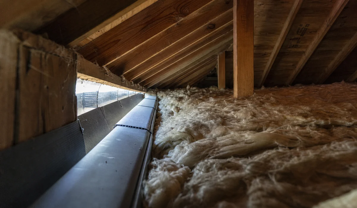 Attic ventilation and insulation detail in a West Hartford home