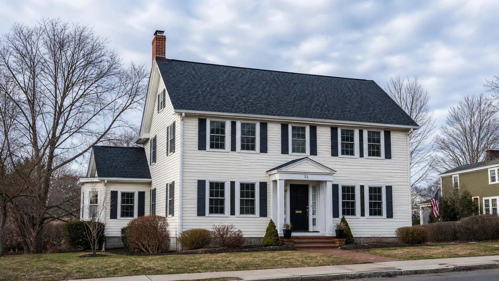 Completed roof replacement on a Wethersfield colonial after winter storm damage